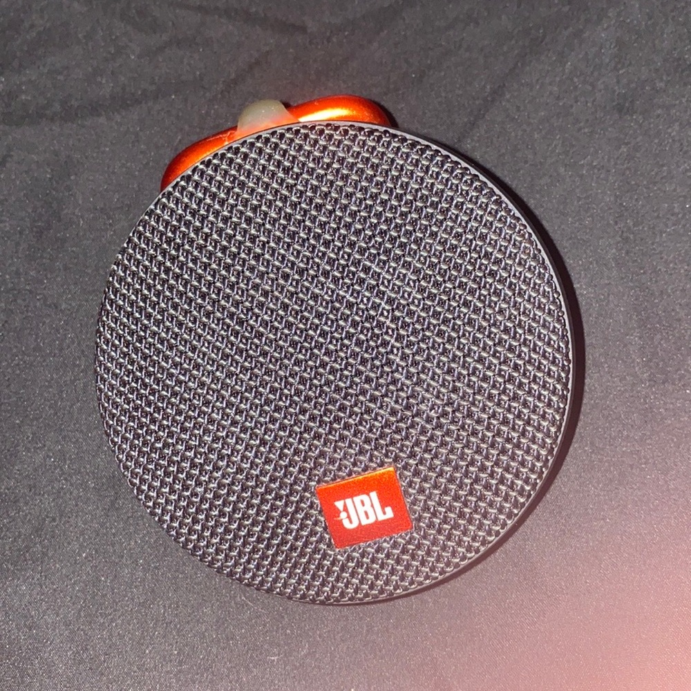 JBL CLIP 2 small but loud , portable , and you can talk on the phone with it